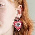 Model Wearing Hot Pink Heart Bead Earrings
