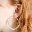 Ice White Beaded Gold Hoop Earrings on Model