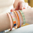 Model Wearing Sage Green Bangles With Others Stacked