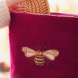 Close Up of Velvet Beaded Bee Make Up Bag in Magenta