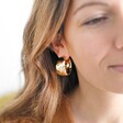 Wide Hammered Hoop Earrings in Gold on Model