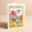 Vintage Floral Bird Print Birthday Card standing on neutral surface