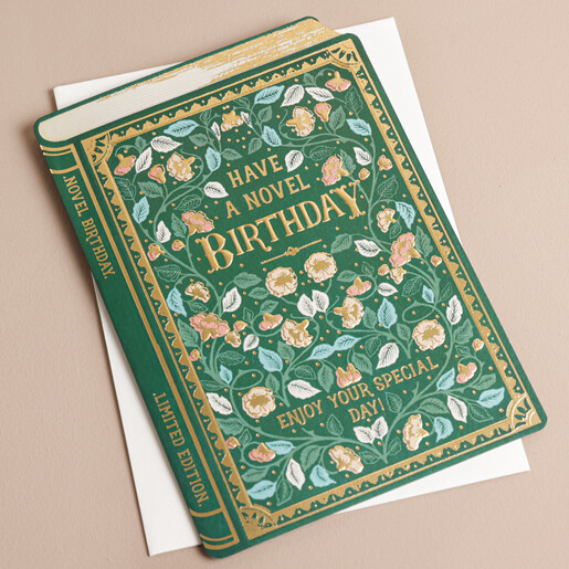 Vintage Novel Birthday Card Vintage Novel Birthday Card on White Envelope on Pink Surface