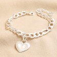 Chunky Figaro Chain and Shell Heart Bracelet in Silver on neutral coloured material