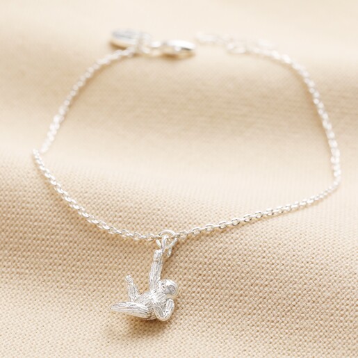 Full Hanging Sloth Bracelet in Silver on beige material