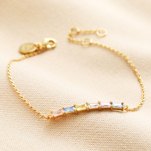 Pastel Baguette Crystal Bar Bracelet in Gold on neutral coloured fabric