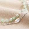 Close Up of Set of 2 Leaf and Green Beaded Chain Bracelets in Silver