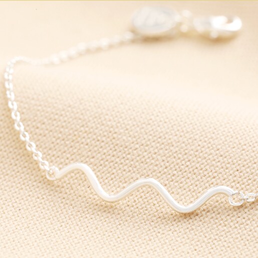 Close up of wavy charm on Wavy Lines Chain Bracelet in Silver