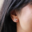 Close Up of Model Wearing Sausage Dog Stud Earrings in Silver