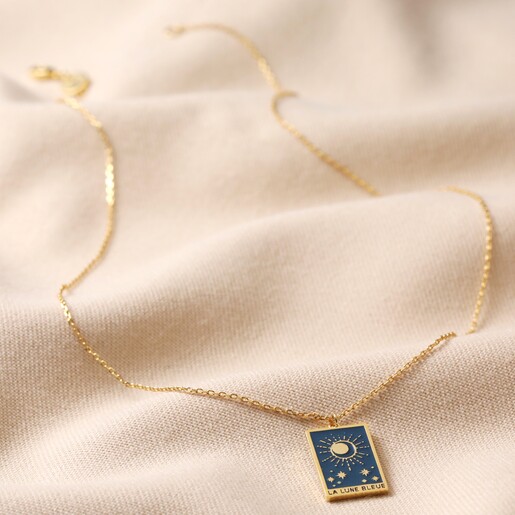 Enamel Blue Moon Tarot Card Pendant Necklace in Gold Full Length on Neutral Fabric