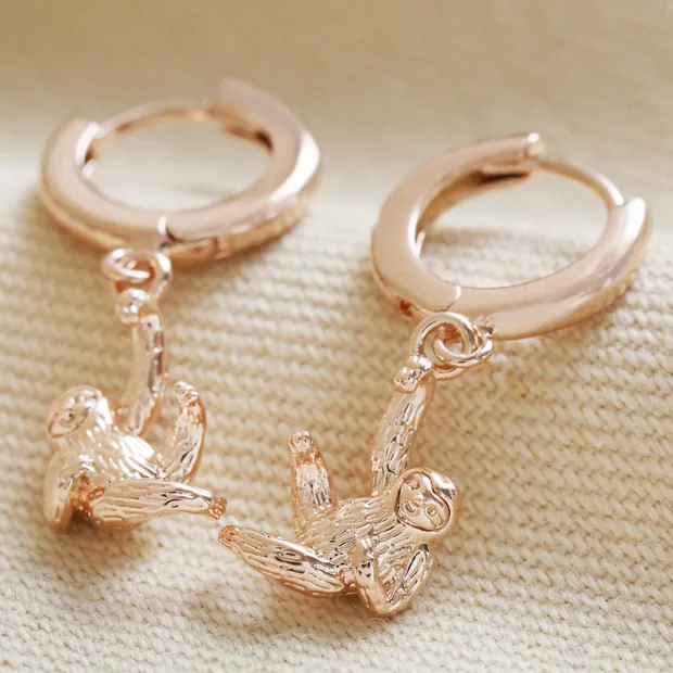 Hanging Sloth Huggie Hoop Earrings in Rose Gold Hanging Sloth Huggie Hoop Earrings in Rose Gold