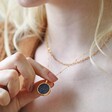 Model Wearing Celestial Semi-Precious Stone Pendant Necklace in Gold with Delicate Chain