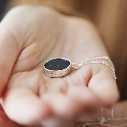 Model Holding Celestial Semi-Precious Stone Pendant Necklace in Silver in Palm