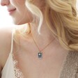 Blonde Model Looking to Side Wearing Enamel Blue Moon Tarot Card Pendant Necklace in Gold