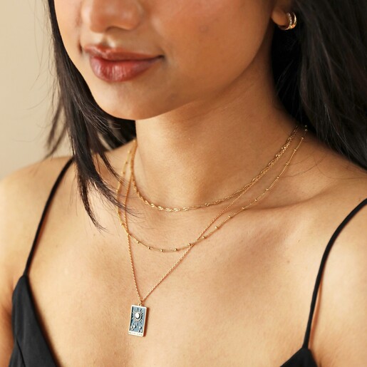 Model Wearing Enamel Blue Moon Tarot Card Pendant Necklace in Gold