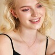 Model smiling wearing Eternity Ring Pendant Necklace in Gold
