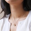 Close Up of Model Wearing Heart and Moonstone Pendant Necklace in Gold