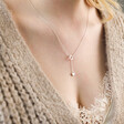 Model Wearing Mismatched Heart Lariat necklace in Silver
