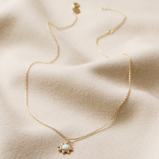 Small gold store sun necklace