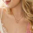 Close Up of Model Wearing Organic Molten Russian Ring Pendant Necklace in Rose Gold