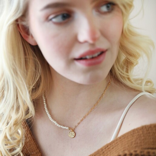 Model Wearing Necklace Model Wearing Talisman Charm Pearl and Chain Necklace in Gold