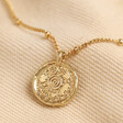Front of Personalised Talisman Satellite Chain Pendant Necklace in Gold pendant against neutral fabric 