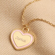 Pink Personalised Enamel Heart Pendant Necklace in Gold on Beige Fabric