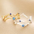 Adjustable Blue Crystal Constellation Ring in Silver with Gold on Neutral Fabric