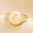 Crystal Sun and Moon Signet Ring in Gold on Beige Fabric