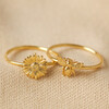 Set of 2 Daisy and Bee Stacking Rings in Gold - L/XL on Neutral Fabric