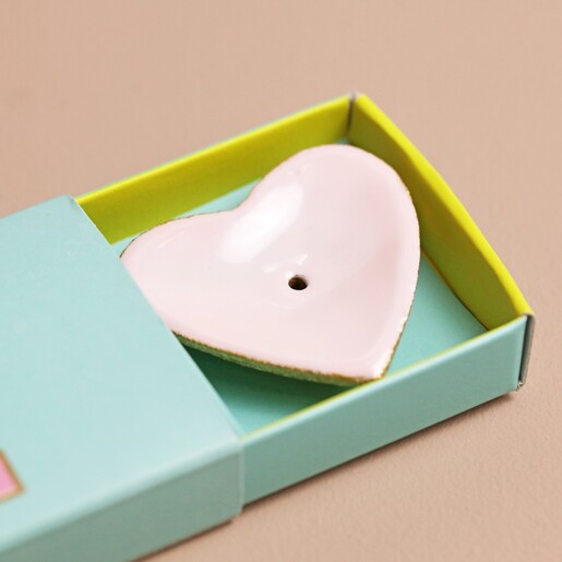 Close up of heart incense holder in packaging from Bombay Duck Love Incense Stick and Holder Set