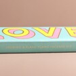 Close up of side of Bombay Duck Love Incense Stick and Holder Set packaging