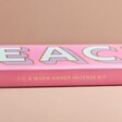 Close up of side of packaging on Bombay Duck Peace Incense Stick and Holder Set