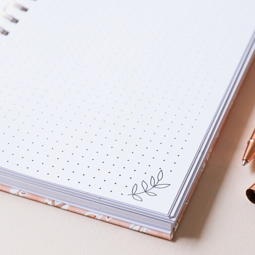 Pink Floral Positivity Planner Open on Dotted Note Page