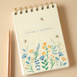 Small Bee Notebook on Beige Background with Rose Gold Pen