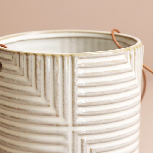 Close up of the geometric design on the Burgon & Ball Grey Modena Hanging Planter