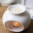 Lisa Angel Lavender and Lemon Soy Wax Melts melting in a ceramic wax burner