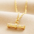 Close Up of Pendant on Estella Bartlett Flower T-Bar Necklace in Gold