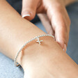 Estella Bartlett Sienna Beaded Kiss Bracelet in Silver on Model