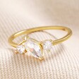 Sterling Silver Clear Crystal Ring in Gold on Neutral Fabric