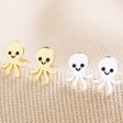 Gold and Silver Sterling Silver Octopus Stud Earrings on Neutral Fabric