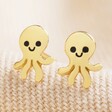 Sterling Silver Octopus Stud Earrings in Gold on Neutral Fabric