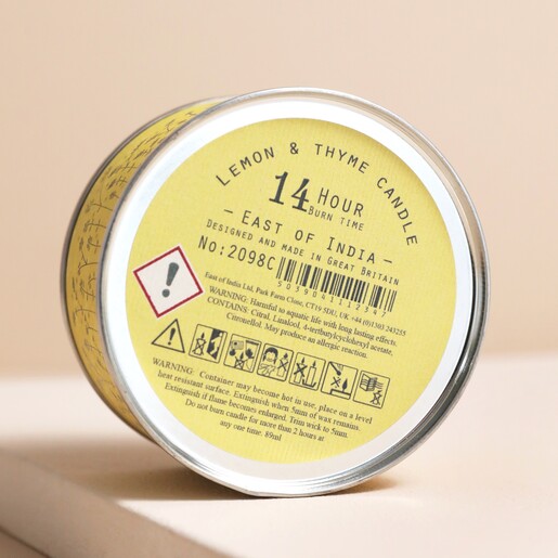 Back of East of India Sending Sunshine Scented Tin Candle Packaging