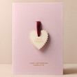 Personalised Wooden Heart Love Token Valentine's Greeting Card on Pink Background