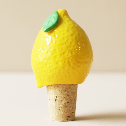Lemon Cork Bottle Stopper on Neutral Background