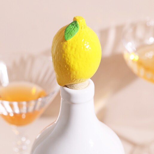 Lemon Cork Bottle Stopper in Neck of White Bottle