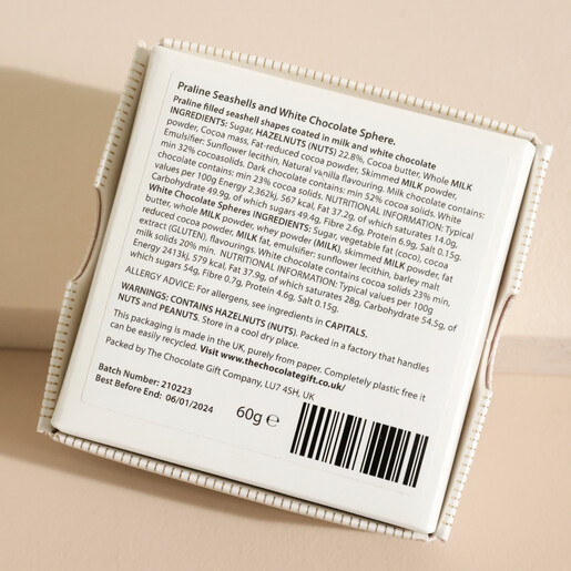 Ingredients List on Back of Box Ingredients List on Back of The World Is Your Oyster Praline Seashell Chocolates