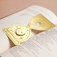 Designworks Ink Celestial Hourglass Metal Bookmark Inside Open Book