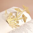 Designworks Ink Mushrooms Metal Bookmark Laying on Pages of Book