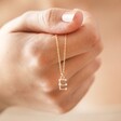 Model Holding E Crystal Constellation Initial Necklace in Gold